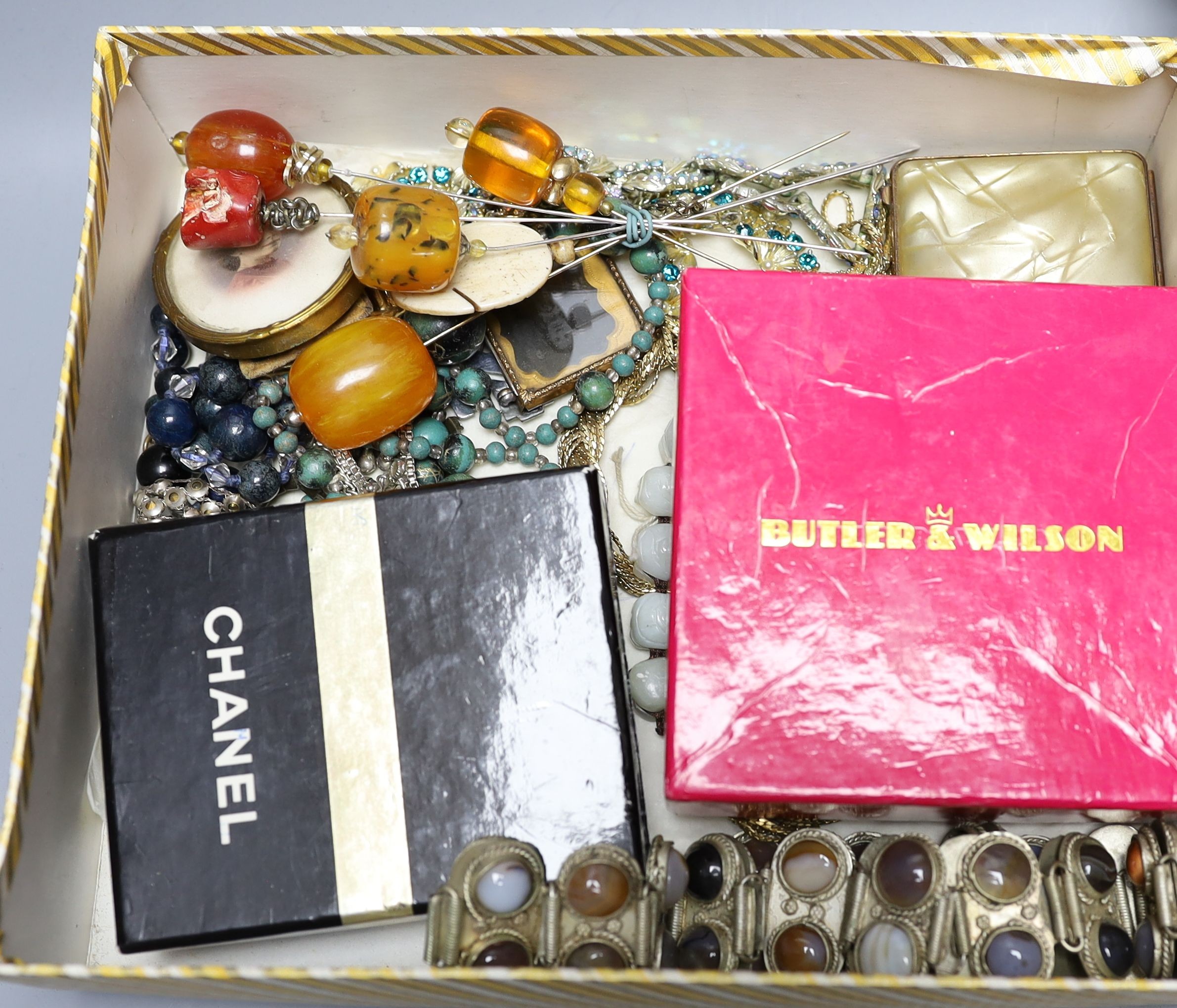 Assorted costume jewellery including gem set stick pins, hat pins, necklaces etc.